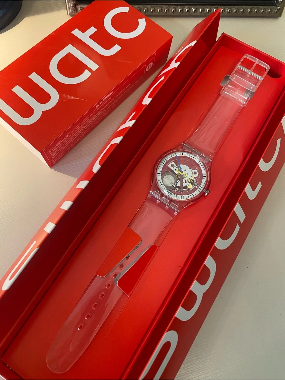 Swatch Transparent Strap Skeleton Watch with Blue Second Hand